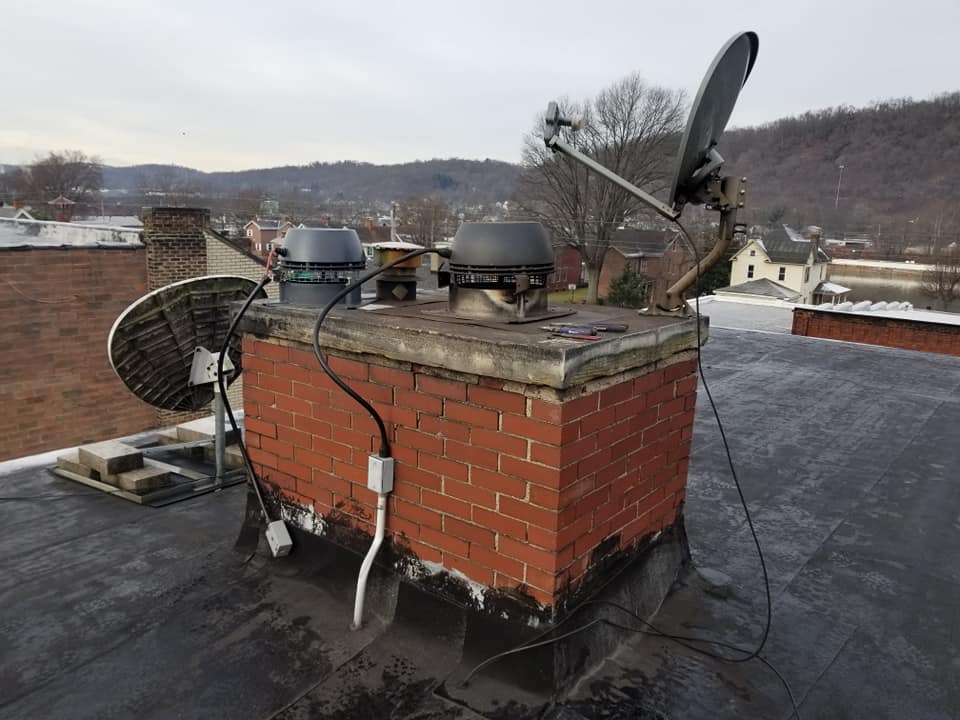 Elizabeth Township Rockwells Red Lion Draft Inducer and Chimney Sweep